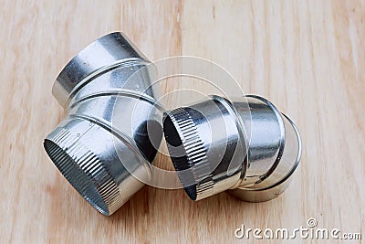 Ventilation pipes on the of the Industrial building. Details of installation Ventilation system, close up Stock Photo