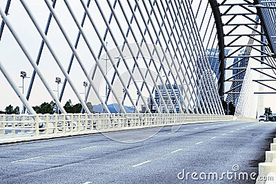 Details of modern architecture - an empty asphalt road on a large bridge in Cyberjaya, Malaysia. Stock Photo