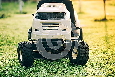 Details of new lawn tractor, industrial tools for landscaping Stock Photo