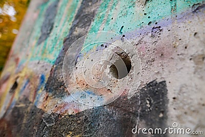 Details of a piece of concrete from the Berlin wall on display in Bucharest, as a symbol of anti communist revolutions in Europe Editorial Stock Photo