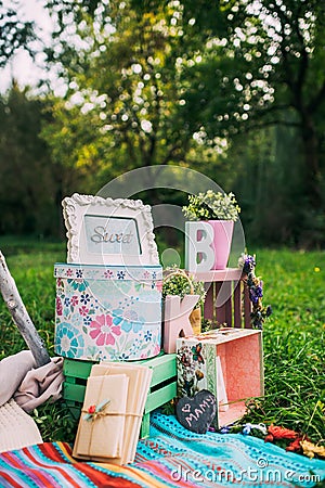 Details of retro decor for a photo shoot in nature in the park on a background of green nature. Stock Photo