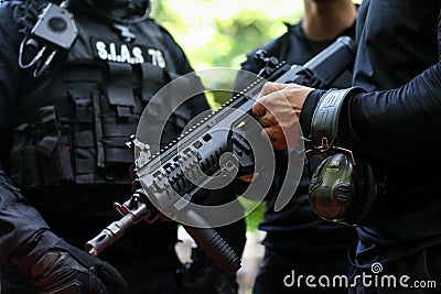 Details of a Romanian SIAS the service for special action of the Romanian Police, equivalent of SWAT in the US officer holding a Editorial Stock Photo
