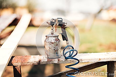 details of spray gun or airbrush in carpentry industry Stock Photo