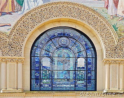 Details of stone carving and stained glass window Editorial Stock Photo