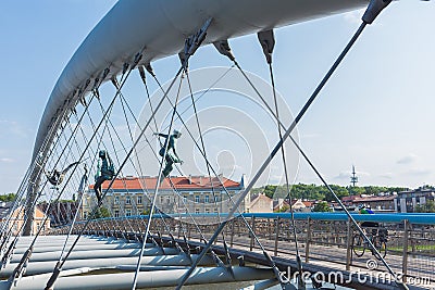 Details of the structure and the sculptures in the Lovers Bridge over the Vistula River in Krakow, Poland. Editorial Stock Photo