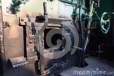 Details of a vintage steam train driving cabin. Stock Photo