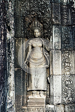 Details of a wall in an old temple in Angkor Wat Stock Photo