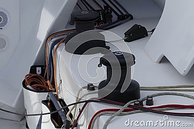 Details of winches and ropes on sailing boat racer, boating concept Stock Photo