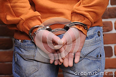 Detainee in handcuffs Stock Photo