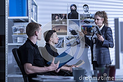 Detective and police officers Stock Photo