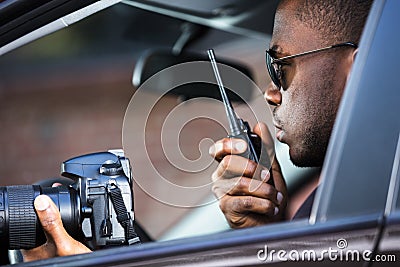Detective Sitting Inside Car Stock Photo