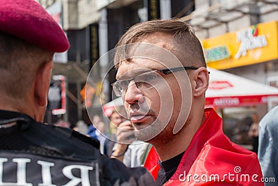 Detention of a member of the volunteer battalion Sich national police during religious procession parishioners Ukrainian Orthodox Editorial Stock Photo