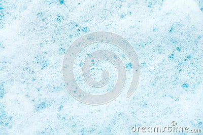 Detergent Foam on Blue Background Stock Photo