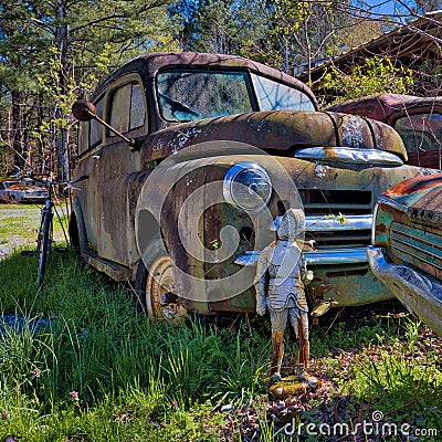 Rusted vintage car in the wilderness Stock Photo