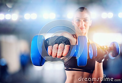 Determinated girl at the gym ready to start fitness lesson Stock Photo