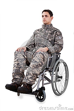 Determined soldier sitting in wheelchair Stock Photo