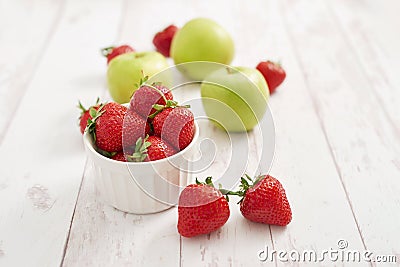 Detox concept. Tasty fruits and berries. Healthly food. Veganism, vegetarianism, raw food diet. Strawberries and apples. Summer Stock Photo