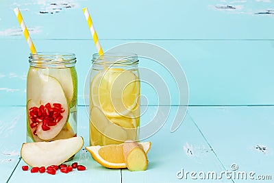 Detox fruit infused flavored water. Refreshing summer homemade cocktail. Clean eating. Copy space. Stock Photo
