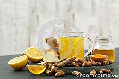 Detox water turmeric lemon and ginger Stock Photo