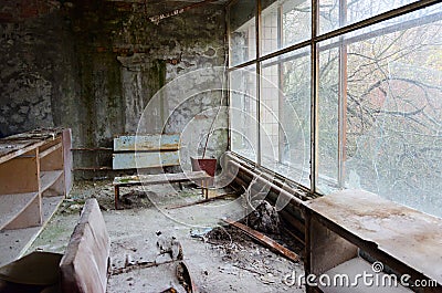 Devastation in hall of hospital No. 126, abandoned ghost town Pripyat in Chernobyl Exclusion Zone, Ukraine Stock Photo