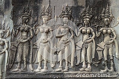 Devatas. One of many bas reliefs in Angkor Wat Temple. Siem Reap, Cambodia. Stock Photo