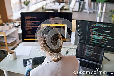 Developer Checking Programming Code Stock Photo