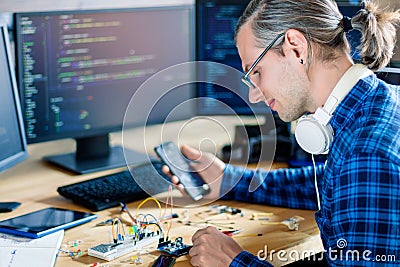 Software developer, freelancer working with hardware Stock Photo