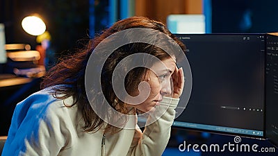 Developer feeling worried and anxious about programming errors Stock Photo