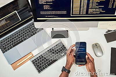 Developer Testing Code of Mobila App Stock Photo