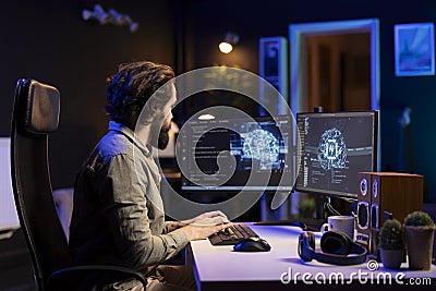 Developer using computer to update AI machine learning algorithm Stock Photo