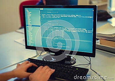 Developer working on source codes on computer at office. Stock Photo