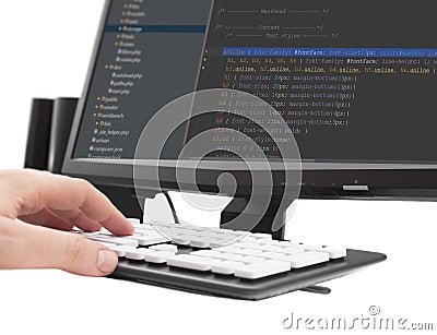 Developer working on source codes on computer at office Stock Photo