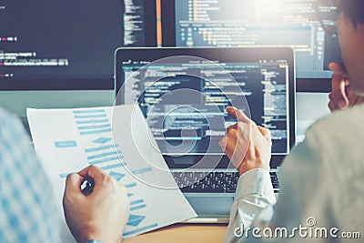 Developing programmer Team Development Website design and coding technologies working in software company office Stock Photo