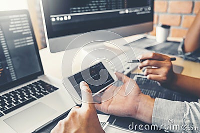 Developing programmer Team Development Website design and coding technologies working at software company office Stock Photo