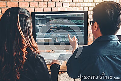 Developing programmer Team Development Website design and coding technologies working in software company office Stock Photo