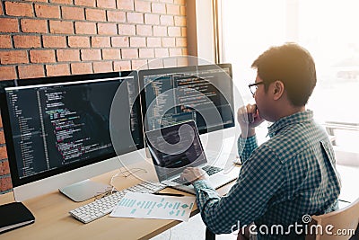 Developing programming and coding technology working in a software develop company office Stock Photo