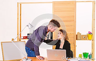 Developing a relationship. Sexual relationship with business partner. Boss and secretary having romantic relationship Stock Photo