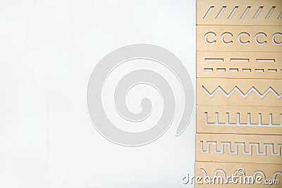 The developing rulers are simulated by Montessori for preschoolers. the concept of preparing a child`s hand Stock Photo
