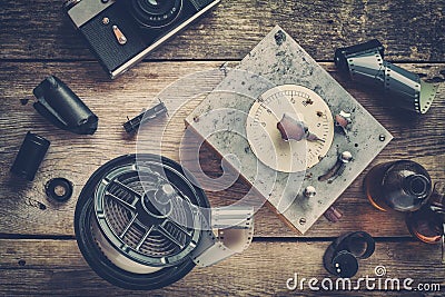 Developing tank with its film reels, film rolls and camera Stock Photo