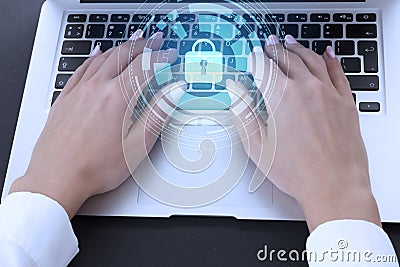 Development of a network security system. Internet data security concept. Female hands on a laptop keyboard and a neon luminous Stock Photo