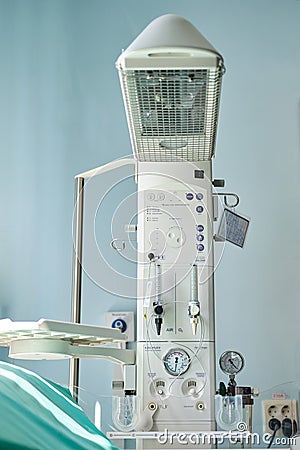 A device for resuscitation of infants and checking the child on the Apgar scale after delivery. Machine for oxygen supply and Editorial Stock Photo