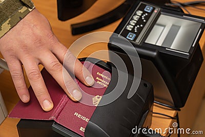 Devices for scanning passport documents, fingerprinting during border control of travelers. Automatic verification of personal Stock Photo