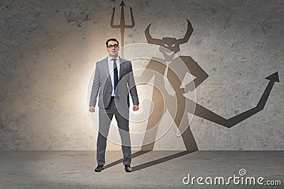 Devil hiding in the businessman - alter ego concept Stock Photo