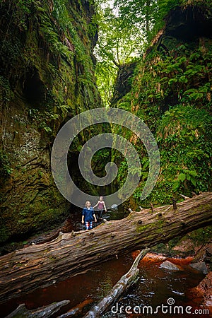 Devil`s Pulpit Gorge, Glasgow, Scotland, UK - 24 July, 2019: Inside of the Devilâ€™s Pulpit gorge Editorial Stock Photo