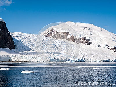 Deville glacier calving in Andvord Bay near Neko Harbor, Arctowski Peninsula, Antarctica Stock Photo