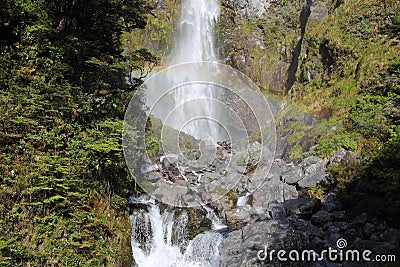 Devils Punchbowl Waterfall and Rainbow Stock Photo