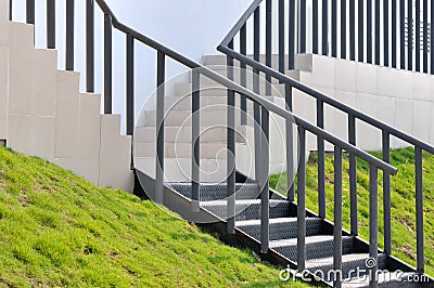 Devious stage with metal handrail Stock Photo