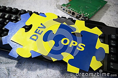 DevOps Concept for software engineering culture and practice of software development and operation and keyboard Stock Photo