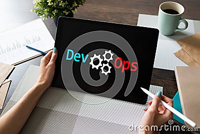 DevOps - development cycles of Automation and monitoring at all steps of software construction. Stock Photo