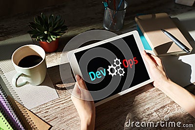 DevOps - development cycles of Automation and monitoring at all steps of software construction. Stock Photo